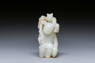 A Chinese white and russet jade sculpture of two boys, Qing