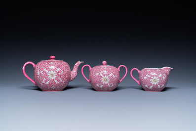 A Chinese 15-piece tea service with lotus scrolls on a purple ground, Guangxu mark, 20th C.