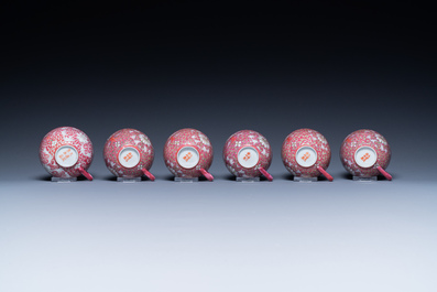 A Chinese 15-piece tea service with lotus scrolls on a purple ground, Guangxu mark, 20th C.
