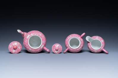 A Chinese 15-piece tea service with lotus scrolls on a purple ground, Guangxu mark, 20th C.