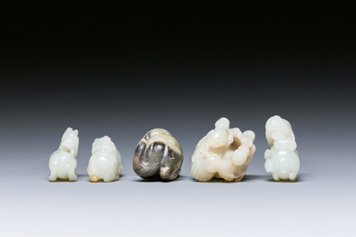 Five Chinese white, celadon and grey-black jade carvings, Qing/Republic