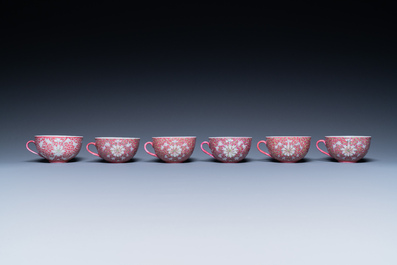 A Chinese 15-piece tea service with lotus scrolls on a purple ground, Guangxu mark, 20th C.
