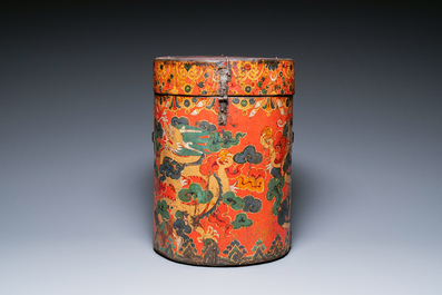 A large leather-clad wooden box and cover painted with dragons on a red ground, Tibet, 17/18th C.