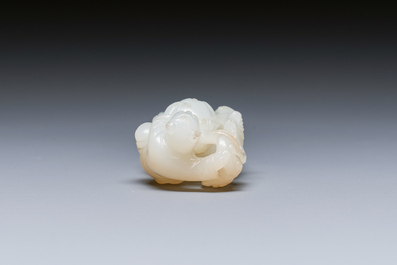 A Chinese white and russet jade sculpture of two boys, Qing