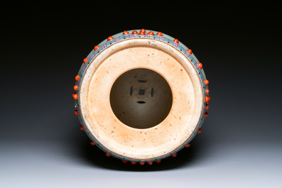 A Chinese famille rose garden seat with ladies in a garden, 20th C.