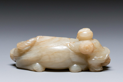 A Chinese jade 'boy on a buffalo' group, Qing