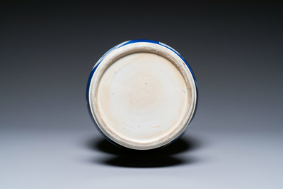 Een Chinese poederblauwe flesvormige vaas met landschapspanelen, Kangxi