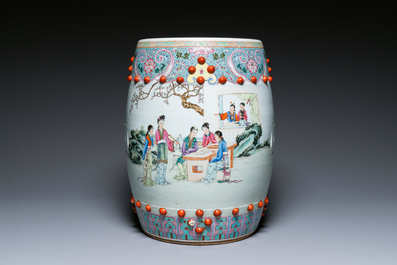 A Chinese famille rose garden seat with ladies in a garden, 20th C.