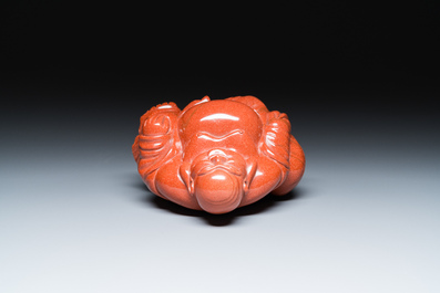 A Chinese emerald green jadeite 'birds' group and a goldstone sculpture of Buddha, 19/20th C.