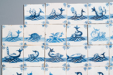 59 blauw-witte Delftse tegels met zeemonsters, 2e helft 18e eeuw