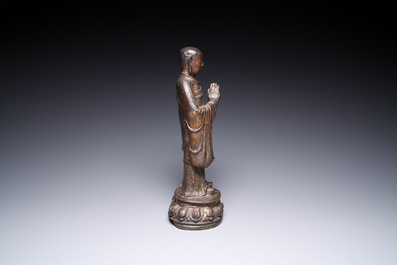 A Chinese gilt bronze standing Buddha, Ming