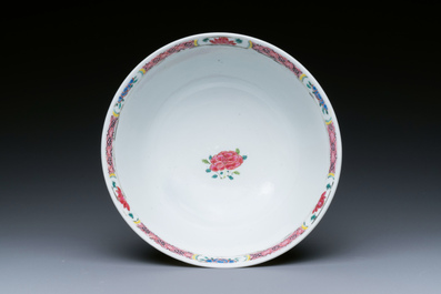 A Chinese famille rose plate and bowl with a nursing mother and men drinking tea on the shore, Yongzheng