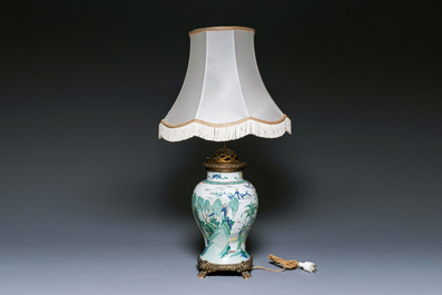 Un vase en porcelaine de Chine famille verte mont&eacute; en lampe, Kangxi