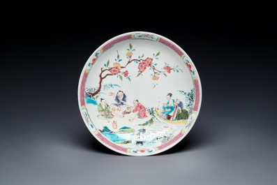 A Chinese famille rose plate and bowl with a nursing mother and men drinking tea on the shore, Yongzheng