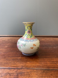 A small Chinese famille rose 'nine peaches' bottle vase, Jiaqing mark, 20th C.
