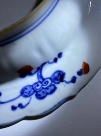 A Chinese clobbered blue and white ewer, a plate and a verte biscuit teapot, Kangxi