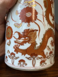 Een Chinese ijzerrode en vergulde rouleau vaas met draken, Kangxi