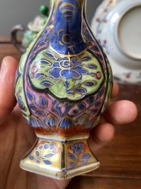 A Chinese clobbered blue and white ewer, a plate and a verte biscuit teapot, Kangxi