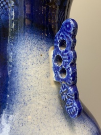 A Chinese blue and white 'dragon and carp' vase, 19th C.