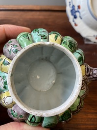 A Chinese clobbered blue and white ewer, a plate and a verte biscuit teapot, Kangxi