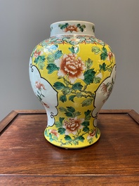 Three Chinese blue, white and famille verte vases, 19th C.