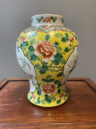 Three Chinese blue, white and famille verte vases, 19th C.