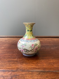 A small Chinese famille rose 'nine peaches' bottle vase, Jiaqing mark, 20th C.