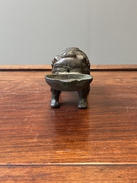 A Chinese inscribed bronze &lsquo;bixie&rsquo; water dropper, Ming