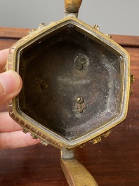 A Chinese gilt bronze tripod censer, 18/19th C.