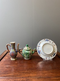 A Chinese clobbered blue and white ewer, a plate and a verte biscuit teapot, Kangxi