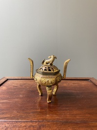 A Chinese gilt bronze tripod censer, 18/19th C.