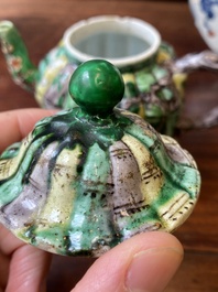 A Chinese clobbered blue and white ewer, a plate and a verte biscuit teapot, Kangxi