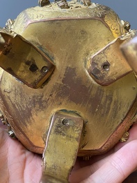 A Chinese gilt bronze tripod censer, 18/19th C.