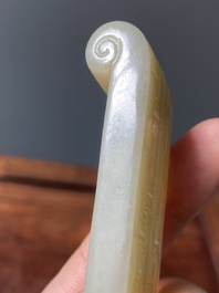 Two fine Chinese white and celadon jade brush rests, Qing