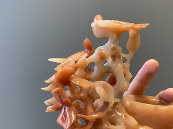 A Chinese carnelian agate sculpture of a vase with branches and birds, 20th C.