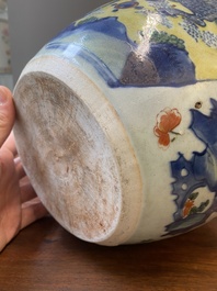 A Chinese wucai 'kylin and sage' jar, Zhao 朝 seal mark, Transitional period