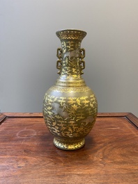 A Chinese gilt- and silver-decorated teadust-glazed vase with bats and cranes among clouds, Qianlong mark, Republic