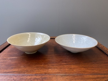 A Chinese qingbai-glazed 'phoenixes' bowl and a cream-glazed 'fish' bowl, probably Song