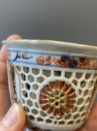 A Chinese Imari-style double-walled reticulated cup and a grisaille and gilt cup, Kangxi/Qianlong