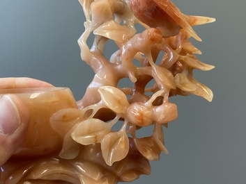 A Chinese carnelian agate sculpture of a vase with branches and birds, 20th C.