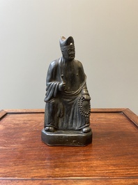 A Chinese monochrome black-glazed figure of Ji Gong, 18th C.