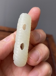 Trois pi&egrave;ces ajour&eacute;es en jade blanc, Chine, Qing