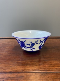 A Chinese overlay Beijing glass 'magpie and plum blossom' bowl in blue on white, 19th C.