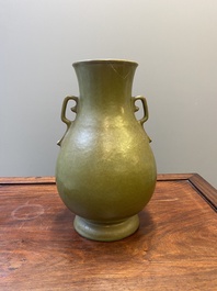 A Chinese monochrome teadust-glazed 'hu' vase, Qianlong mark, 19/20th C.