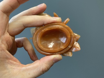 A Chinese carnelian agate sculpture of a vase with branches and birds, 20th C.