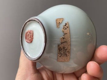 A Chinese celadon-glazed water pot on wooden stand and a small 'hu' vase, 19/20th C.