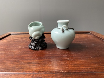 A Chinese celadon-glazed water pot on wooden stand and a small 'hu' vase, 19/20th C.