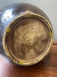 A large Chinese aubergine-glazed triple gourd vase, 18th C.