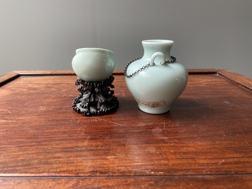 A Chinese celadon-glazed water pot on wooden stand and a small 'hu' vase, 19/20th C.