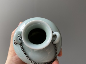 A Chinese celadon-glazed water pot on wooden stand and a small 'hu' vase, 19/20th C.